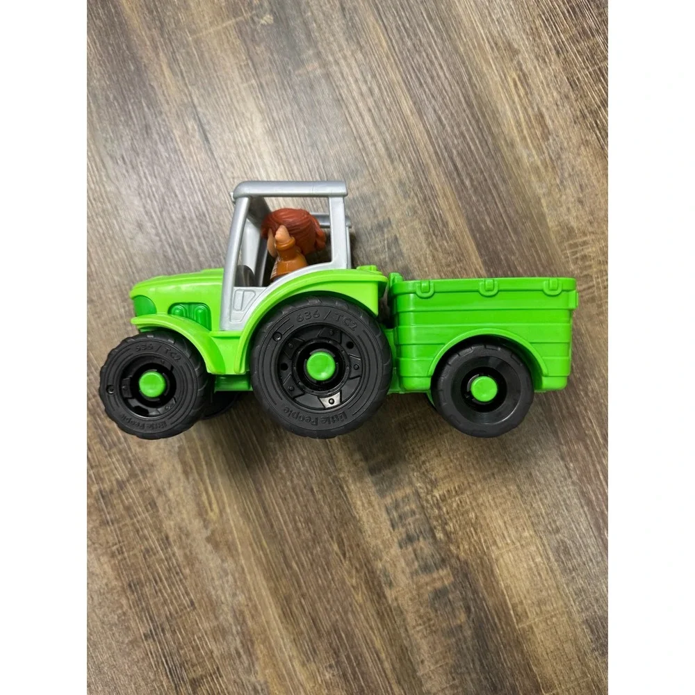 Fisher-Price Little People Caring for Animals Tractor Green with Trailer Dog Fig